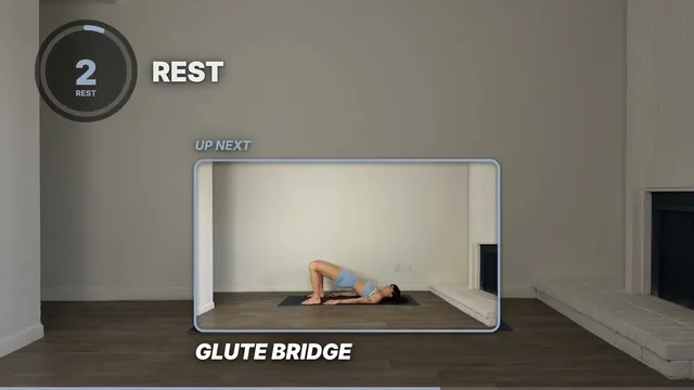 A rest in a finished workout video: the ring timer at 2 beside REST, and an UP NEXT window playing Glute Bridge.